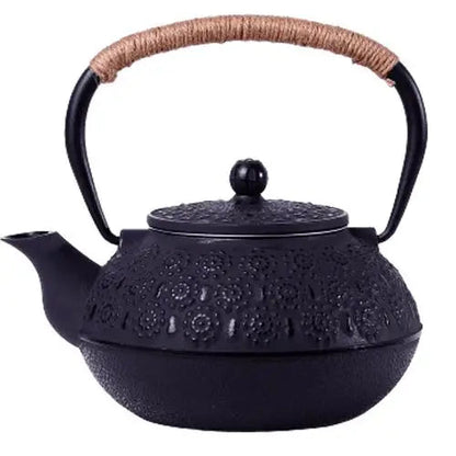 Black Japanese cast iron teapot with engraved flower pattern, 30 oz