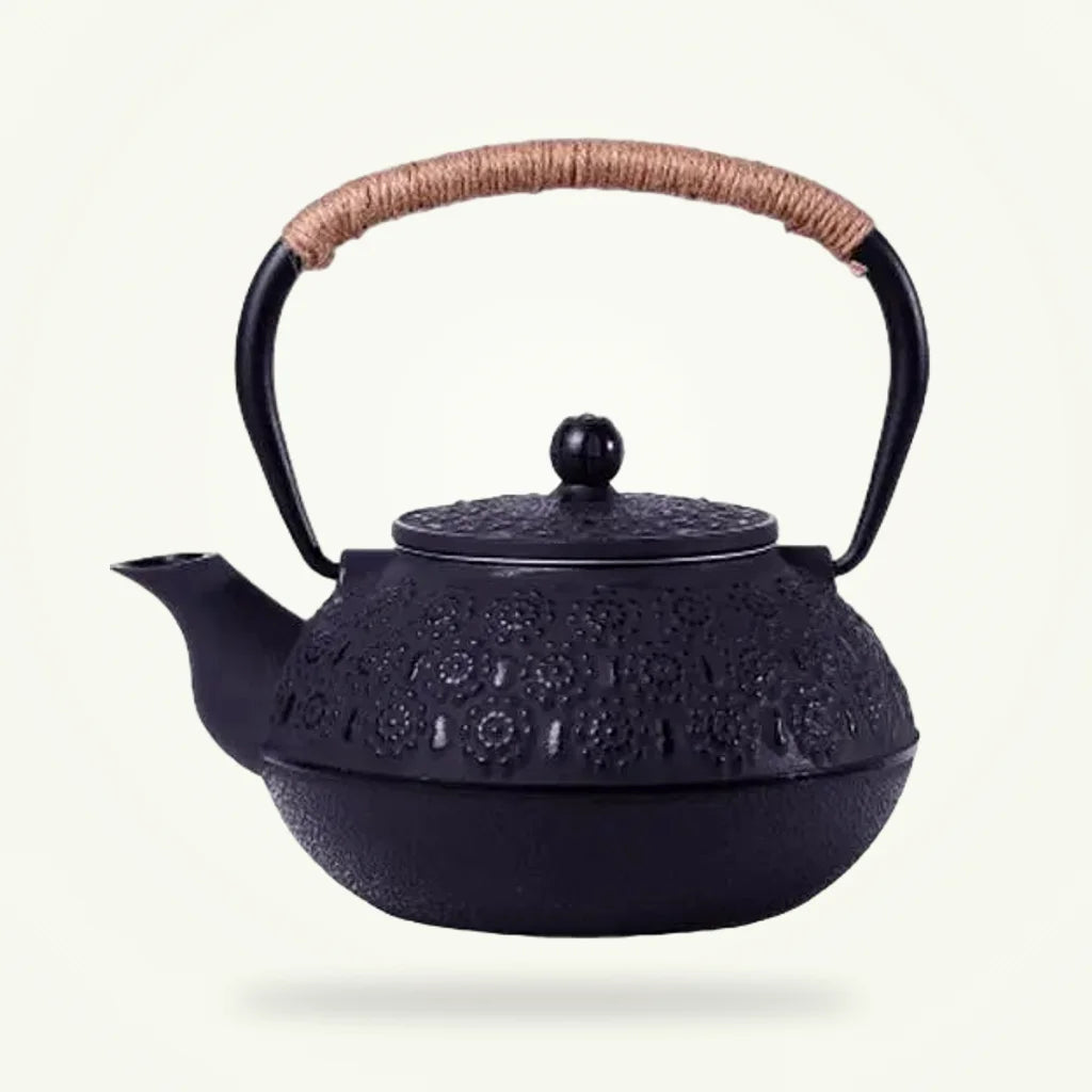 Black Japanese Cast Iron Teapot with Flower Engravings, 30 oz, product photo on a plain background