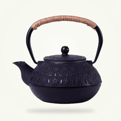 Black Japanese Cast Iron Teapot with Flower Engravings, 30 oz, product photo on a plain background