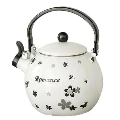 Whistling teapot with black butterflies on white porcelain