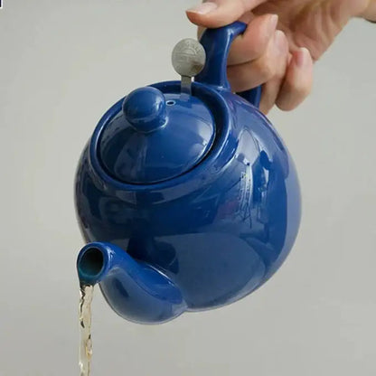 Close-up of blue ceramic teapot glaze