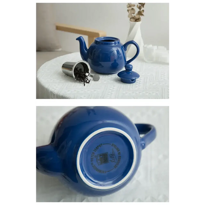 Blue ceramic teapot in kitchen setting