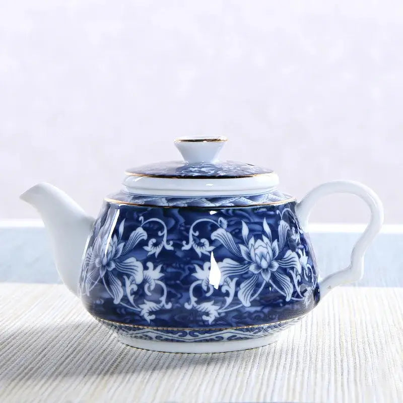 Blue floral ceramic teapot with matching lid