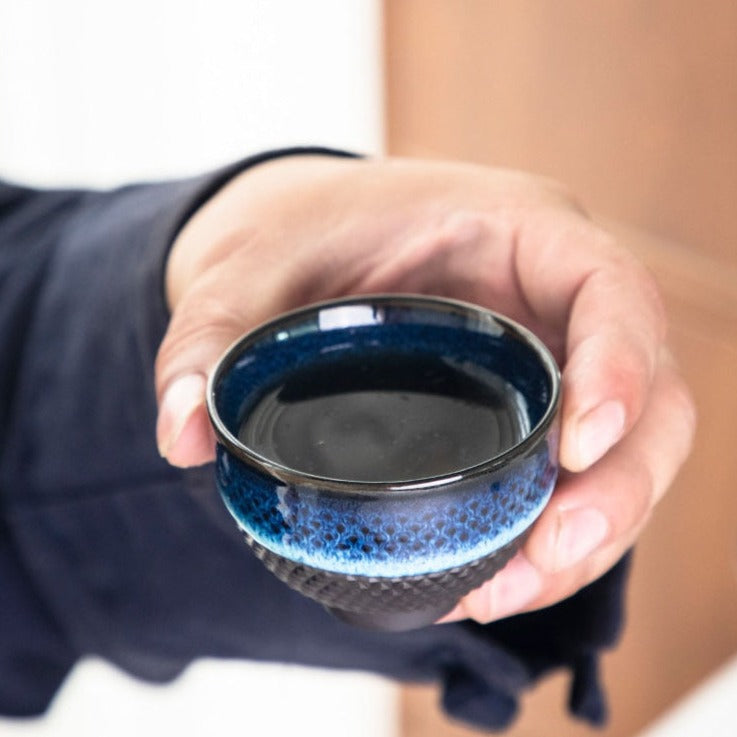 Elegant blue teapot and gaiwan set for tea ceremony