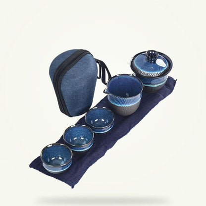 Blue enameled Chinese teapot with gaiwan 200ml set on plain background