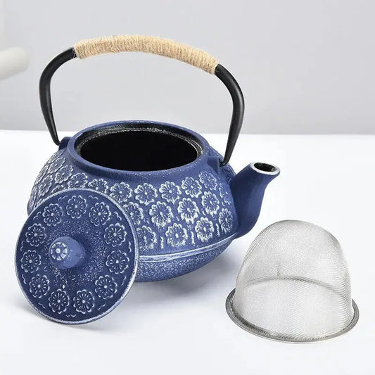 Blue Japanese cast iron teapot with raised floral pattern, 34 oz