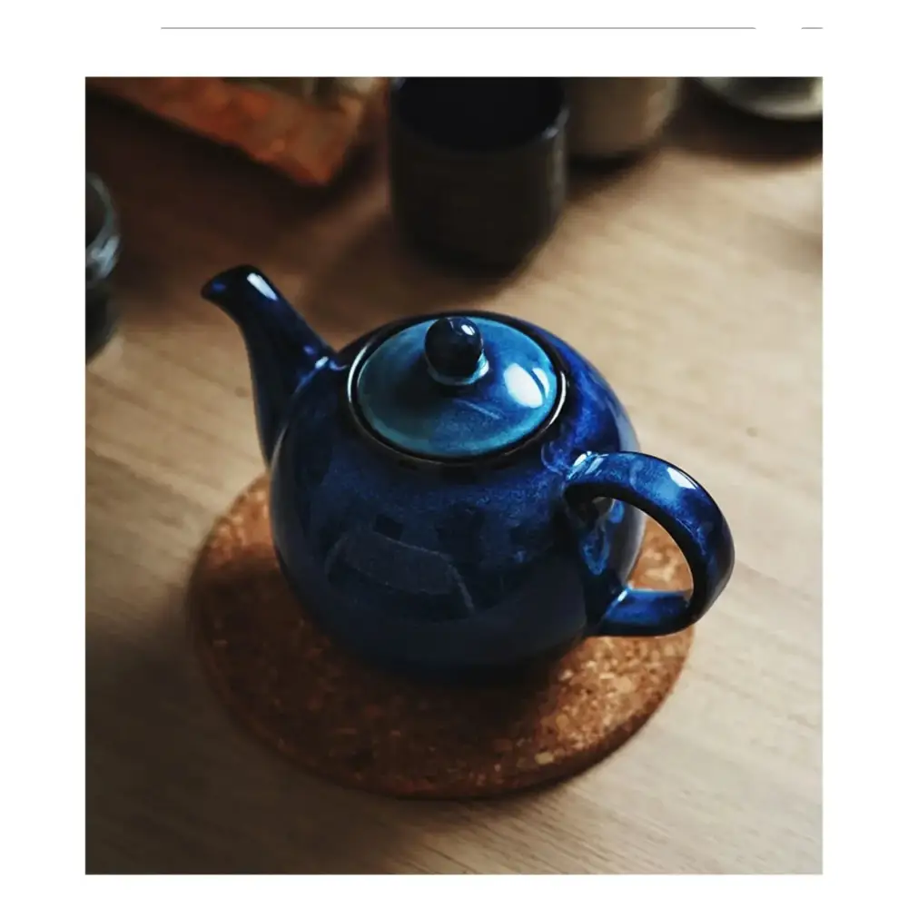 Blue night ceramic teapot with spout and lid