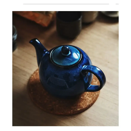 Blue night ceramic teapot with spout and lid