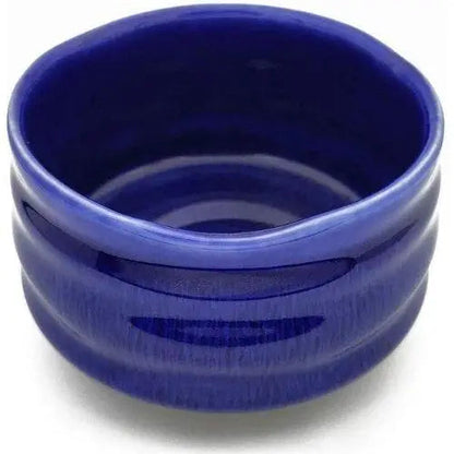 Handcrafted blue chawan with matcha whisk