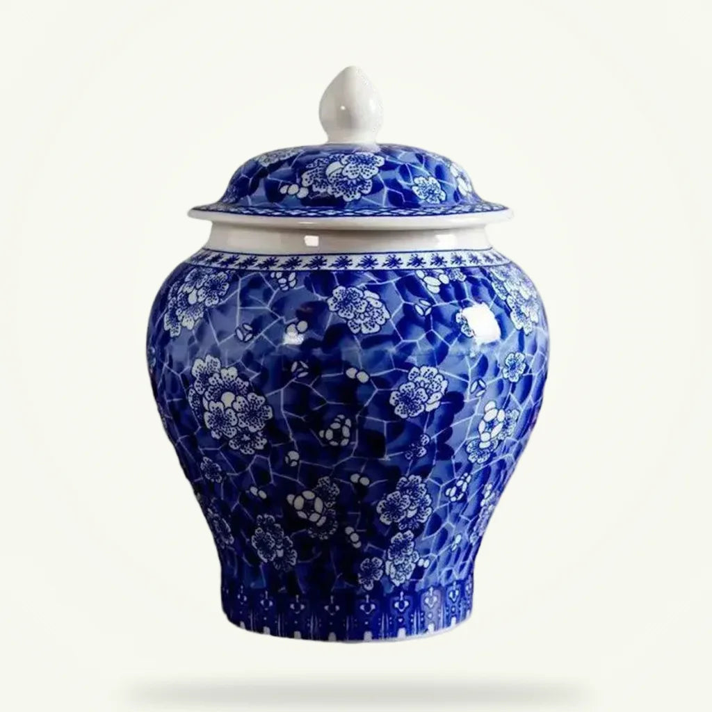 Blue porcelain tea canister with lid, packshot on plain background