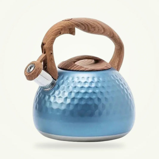 Blue vintage whistling tea kettle 3L with wood handle, packshot on plain background