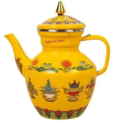 Buddhist tea kettle showing yellow enamel finish and Eight Auspicious Symbols artwork