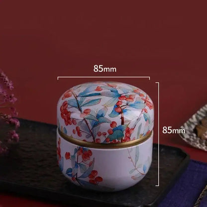 Cast iron tea storage caddy with two compartments, textured lid close-up