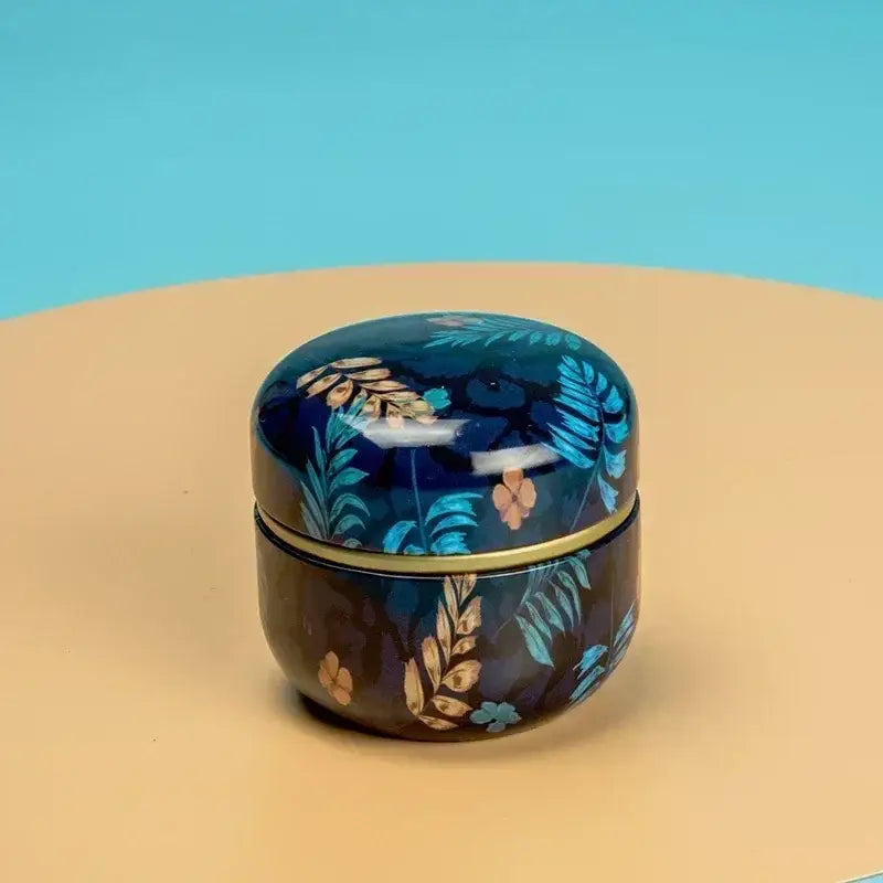 Double compartment cast iron tea caddy showing lid seal and interior sections