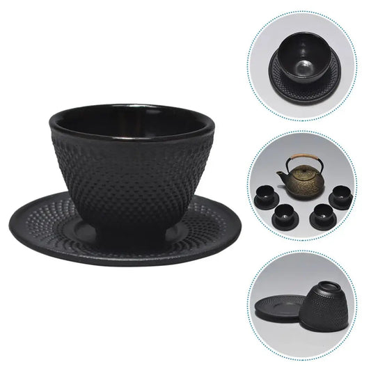 Cast iron tea cup and saucer set in matte black finish, front view