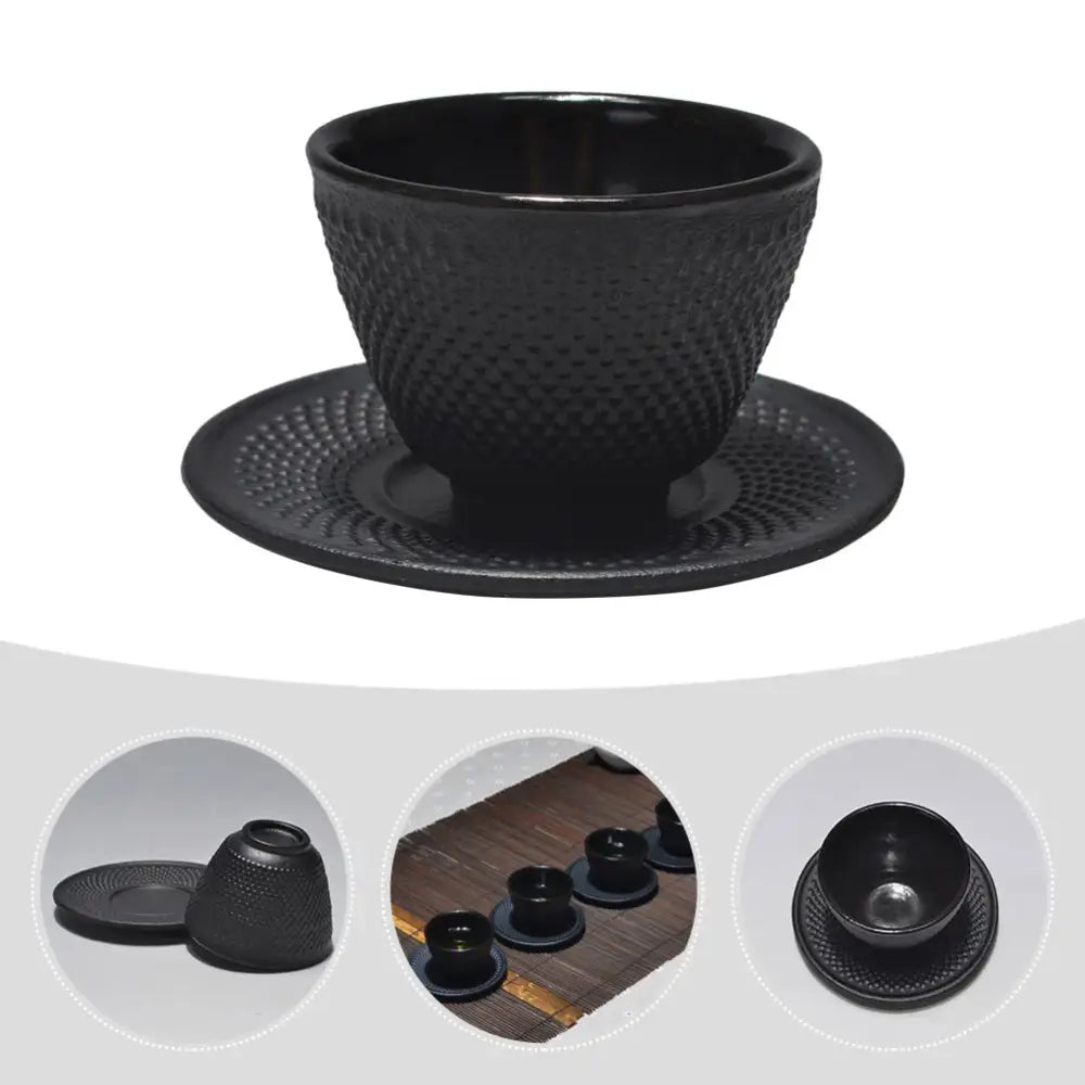 Cast iron cup and saucer for tea, enamel lined interior visible