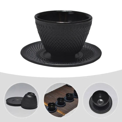 Cast iron cup and saucer for tea, enamel lined interior visible