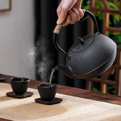 Raw cast iron teapot with granule texture, induction-compatible base