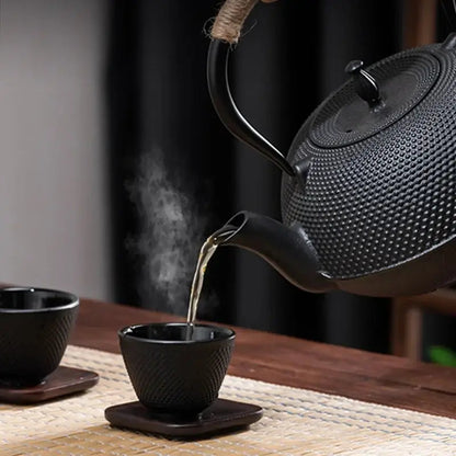 Close-up of cast iron teapot spout and lid knob, 900ml induction pot