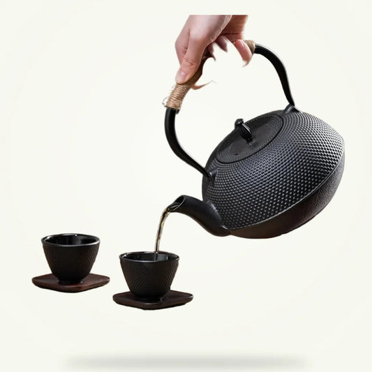 Cast iron teapot for induction stovetop set, 900ml and 300ml, product photo on plain background