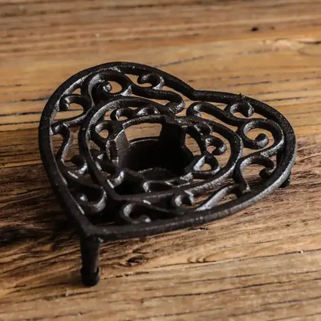 Cast iron teapot warmer model four