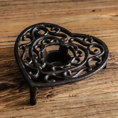 Cast iron teapot warmer model four