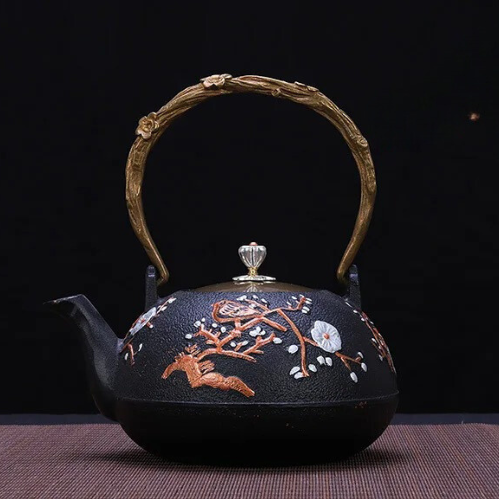 Cast iron teapot with steam rising from spout, showing heat retention in action