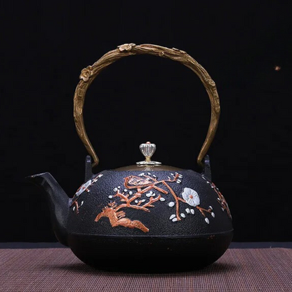 Cast iron teapot with steam rising from spout, showing heat retention in action