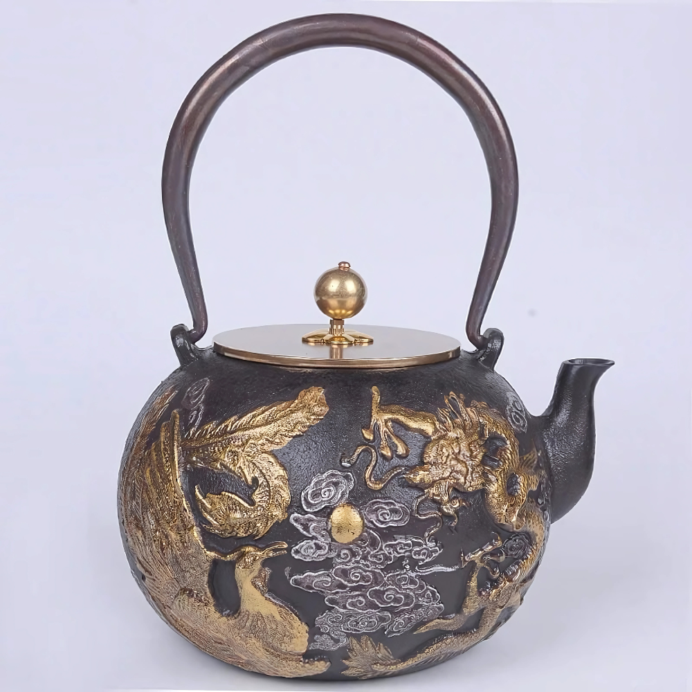 Cast iron teapot with copper handle and lid, side view