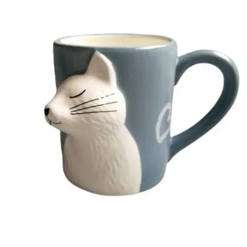 White cat ceramic tea mug close-up showing textured fur detail