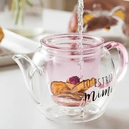 Cat glass teapot in use, steeping tea
