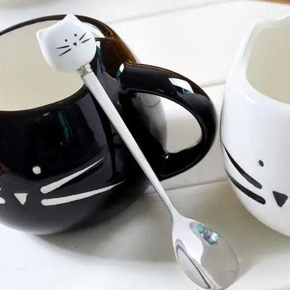 Black cat mustache tea cup close up