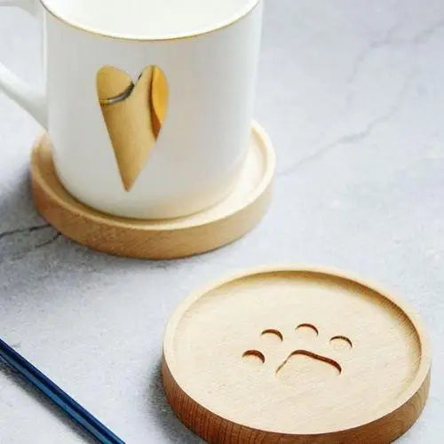Round cat paw coaster on table