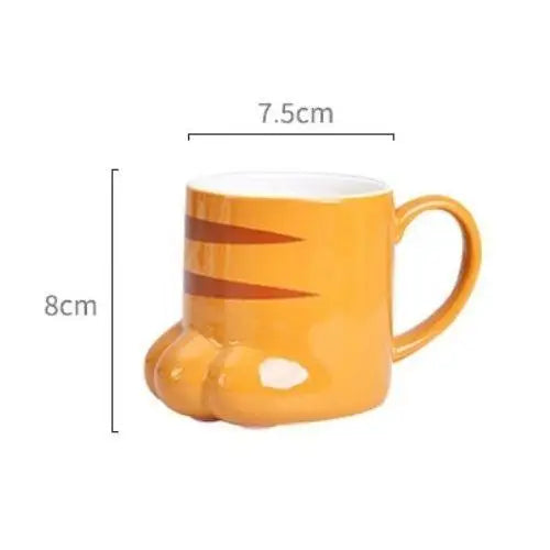 Cat paw porcelain mug with lid and steam rising from hot tea inside