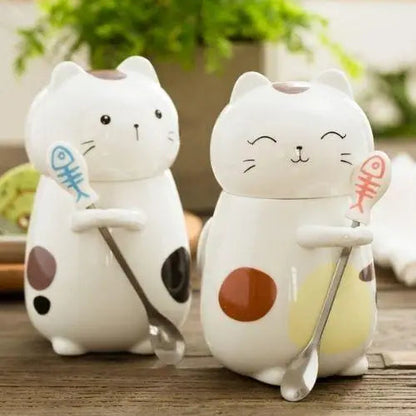 Cat tea mug with lid and spoon on white background