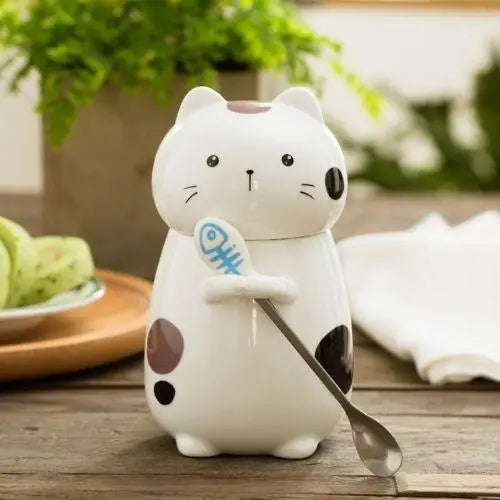Cat tea mug with lid open showing tea