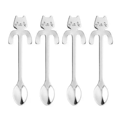 Close-up of cat-shaped handle on stainless steel tea spoon