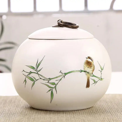 Ceramic tea canister with fitted airtight lid, white background