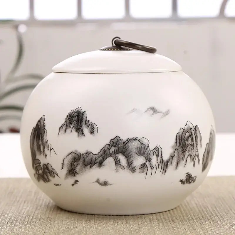 Mountain design ceramic airtight tea canister, side profile view