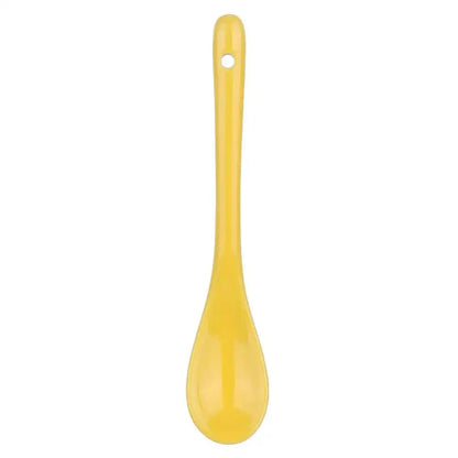 Yellow ceramic tea spoon for desserts