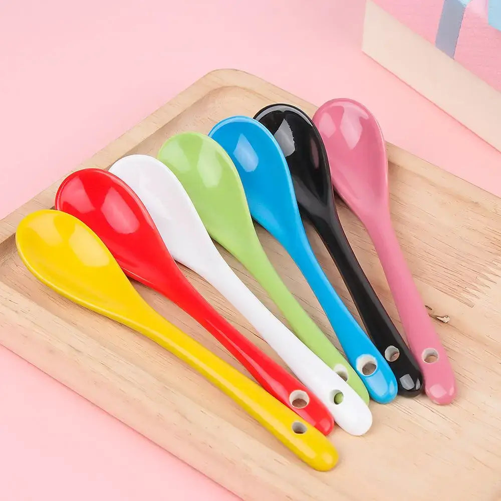 Ceramic tea spoons arranged on a table