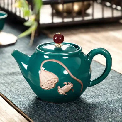 Emerald green ceramic teapot for one with steam