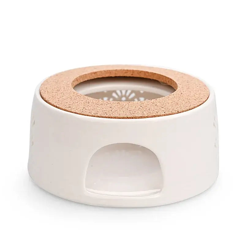 White ceramic teapot warmer style 5 with cork base, overhead angle