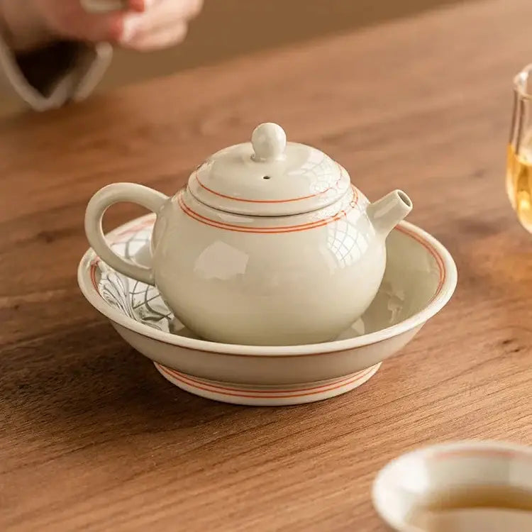 Handmade ceramic teapot with clean lines, 150ml capacity