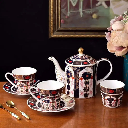 Elegant ceramic teapot with gold accents