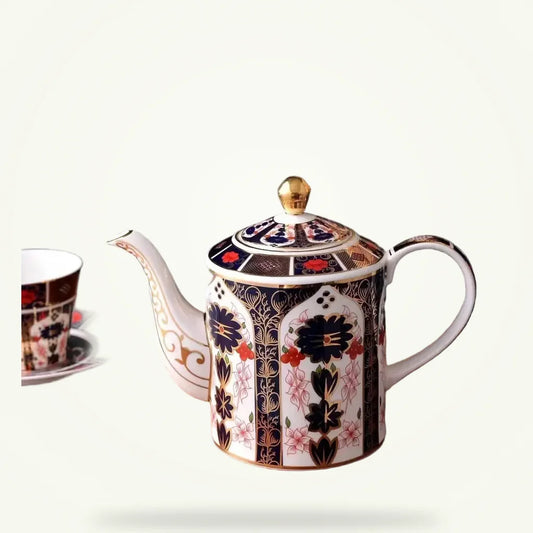 Ceramic Teapot with Floral Motifs, product photo on a plain background