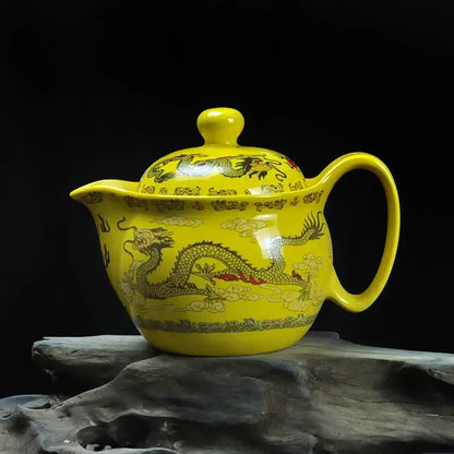 Yellow ceramic dragon teapot with built-in infuser