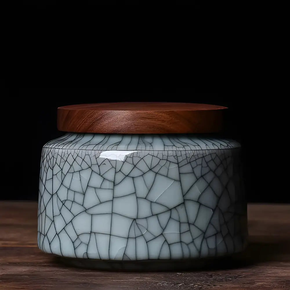 Dark blue patterned Chinese ceramic tea storage canister side view