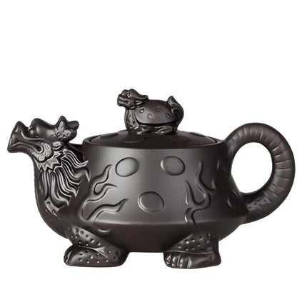 Black Chinese clay teapot with dragon handle, unglazed finish