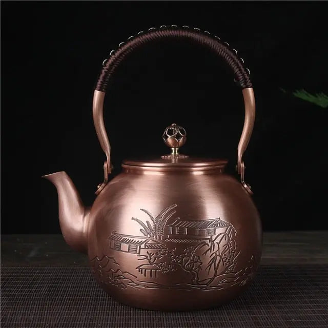 Hand-engraved fields motif detail on Chinese copper teapot, 1.5L, warm copper finish